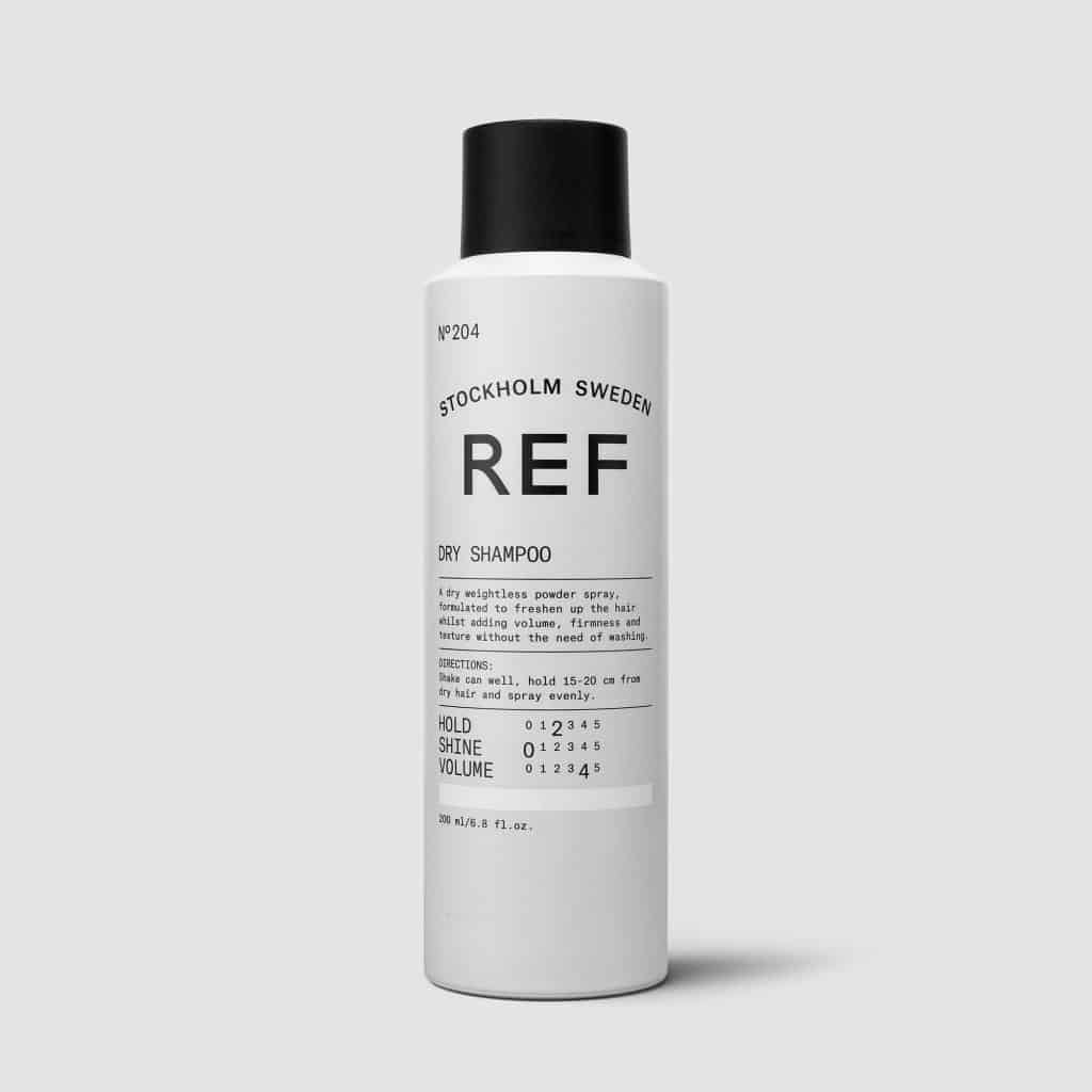 REF Dry Shampoo Brown N°204: A dry weightless powder spray formulated to freshen up hair. Dry spray shampoo. Gives volume, texture &amp; refreshes hair between washes, removes oil from scalp. 100% Vegan, Paraben free, Sulphate free. Color preserving. 1234