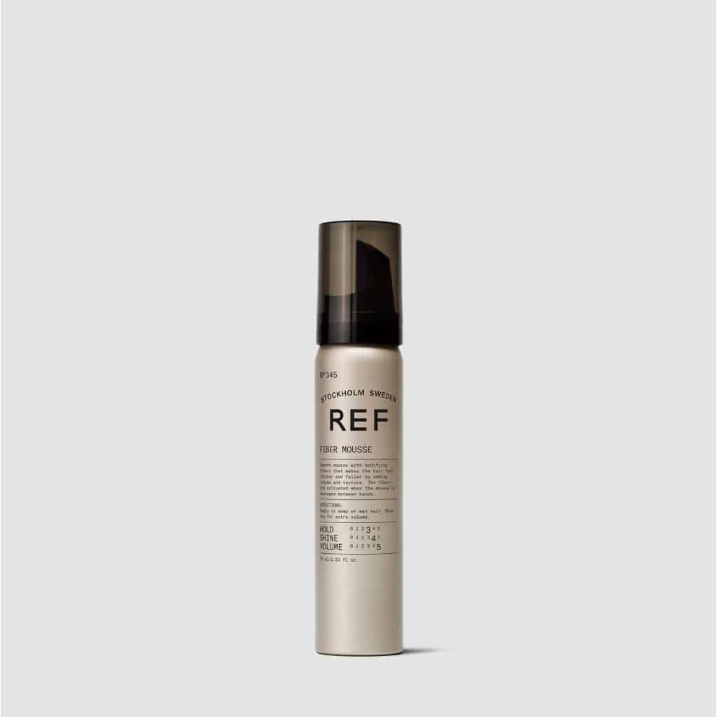 REF Fiber Mousse N°345: A smooth mousse with active fibers that makes hair thicker and fuller, adding volume and texture from root to end.  Activated when mousse is massaged between hands. Natural heat protection, long lasting hold and a natural shine. 100% Vegan, Paraben free, Sulphate free. Color preserving.1234